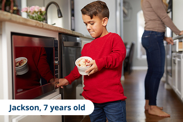 Jackson, child with achondroplasia cooking